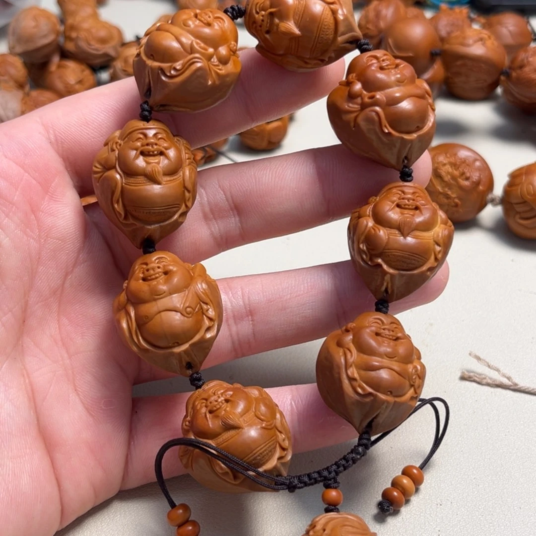 橄榄核吊坠玖****。2.3包衣财迷