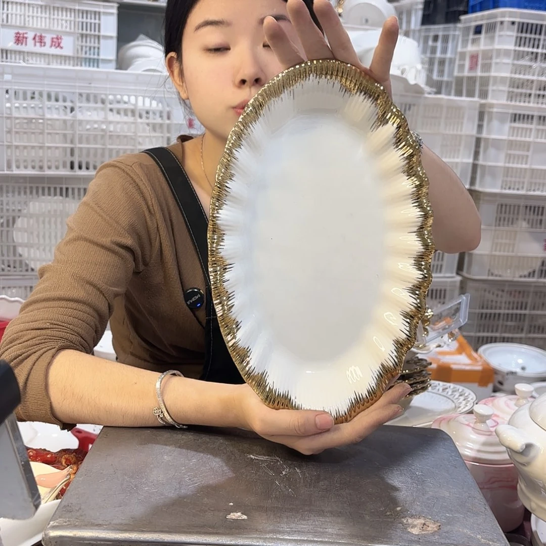 盘微瑕产品………浪花金边鱼盘