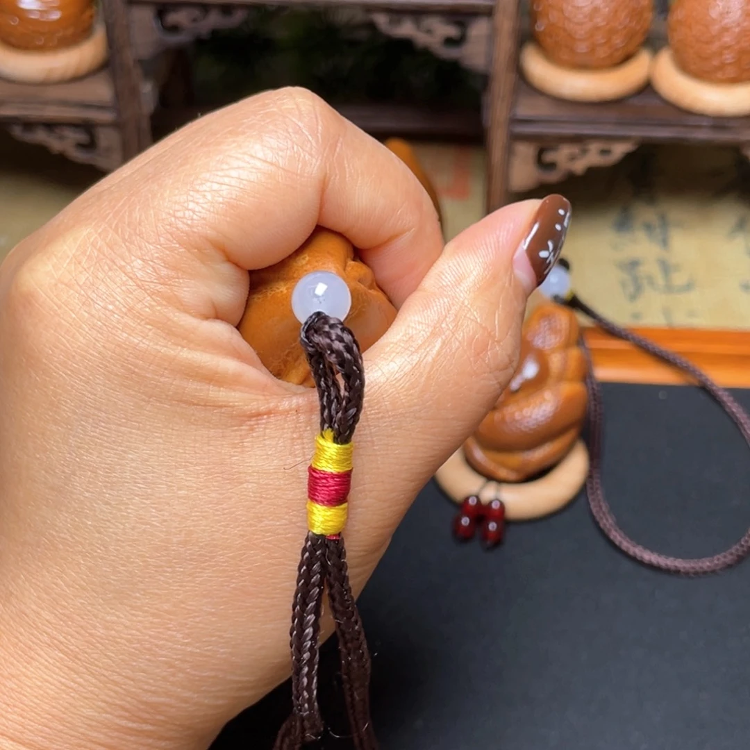 橄榄核吊坠三面穿忒