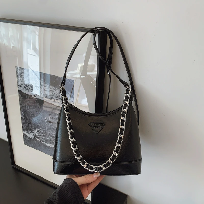 2025春夏新款单肩斜挎腋下小香风链条托特包包女百搭通勤风月牙包