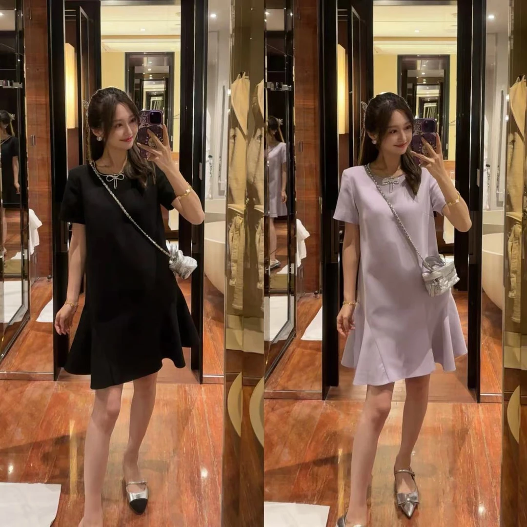 W·HAHA【回馈价】【黑加仑】赫本风简约蝴蝶结钉钻鱼摆连衣裙 77559