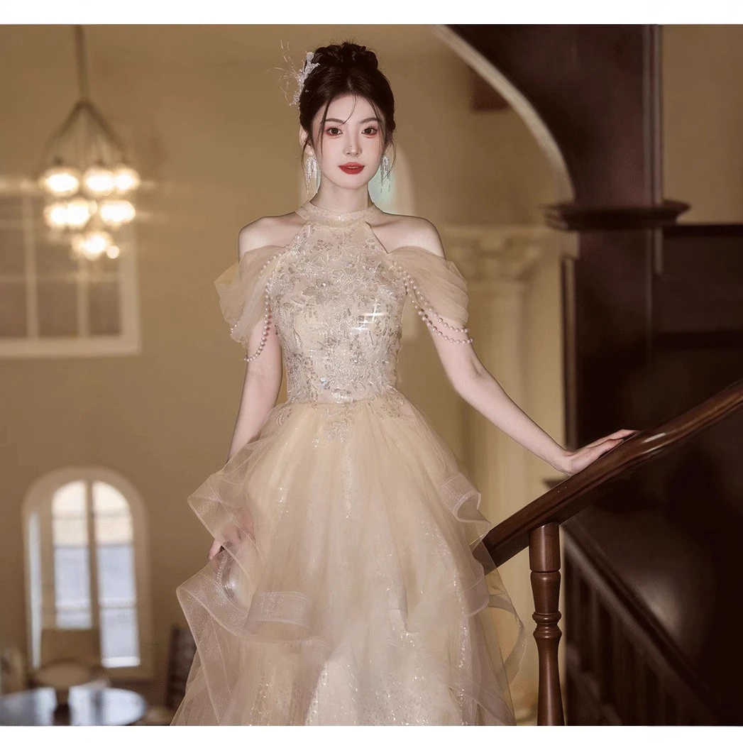 晚礼服香槟色气质女新款挂脖式连衣裙主持成人礼高端仙气蓬蓬纱裙