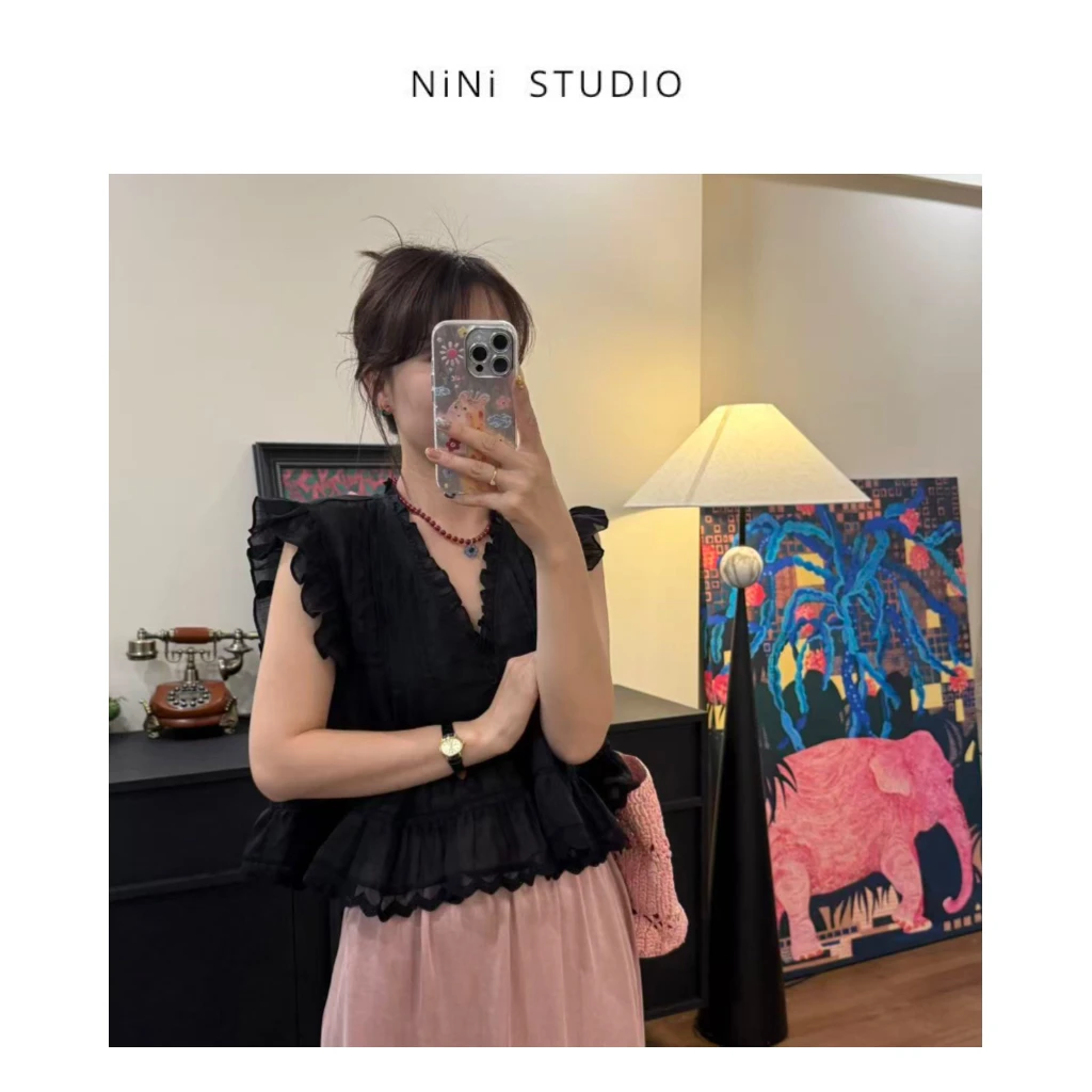 NiNi:欧货精致苎麻花边黑色娃娃衫～