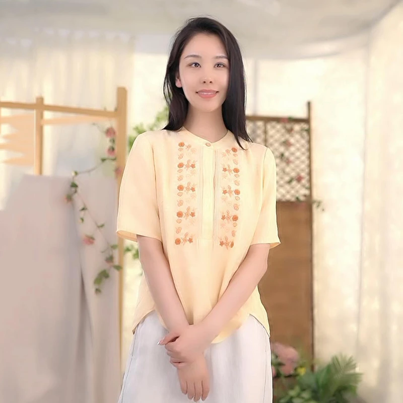 KXDX21布符新款原创设计宽松别致设计感刺绣弧摆上衣女减龄