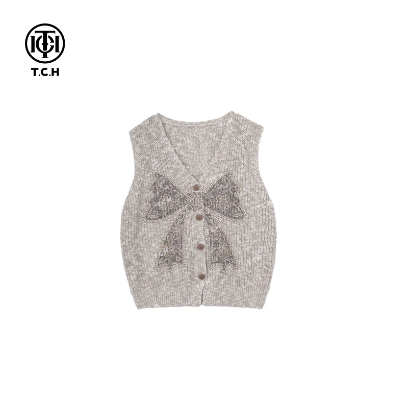 山东-TCH潮牌气质百搭米色蝴蝶结烫钻时尚针织女士T75A09E5026