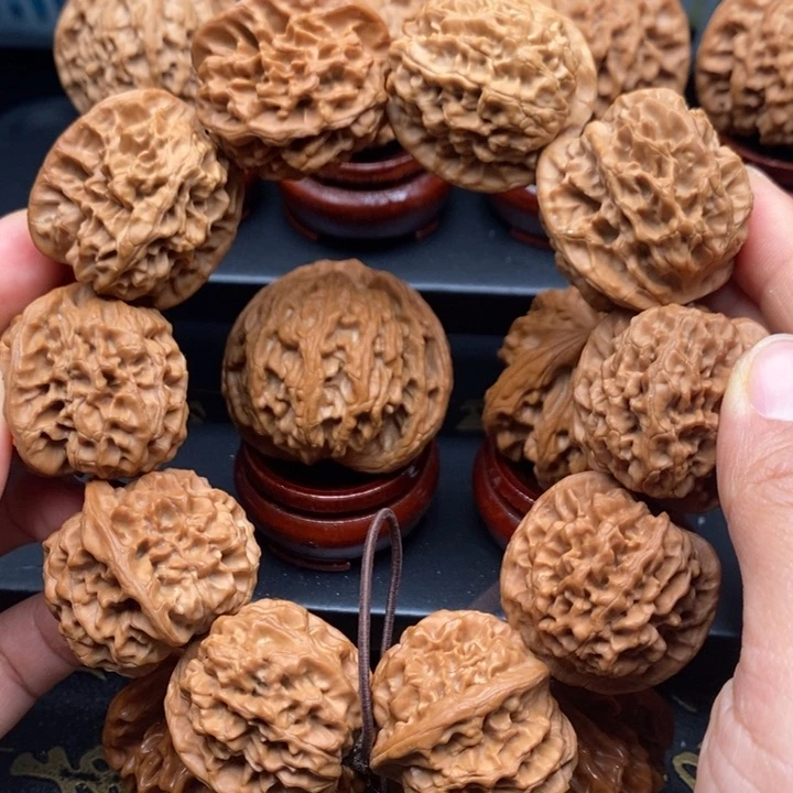 文玩核桃把件_****。秦岭手持32尺寸