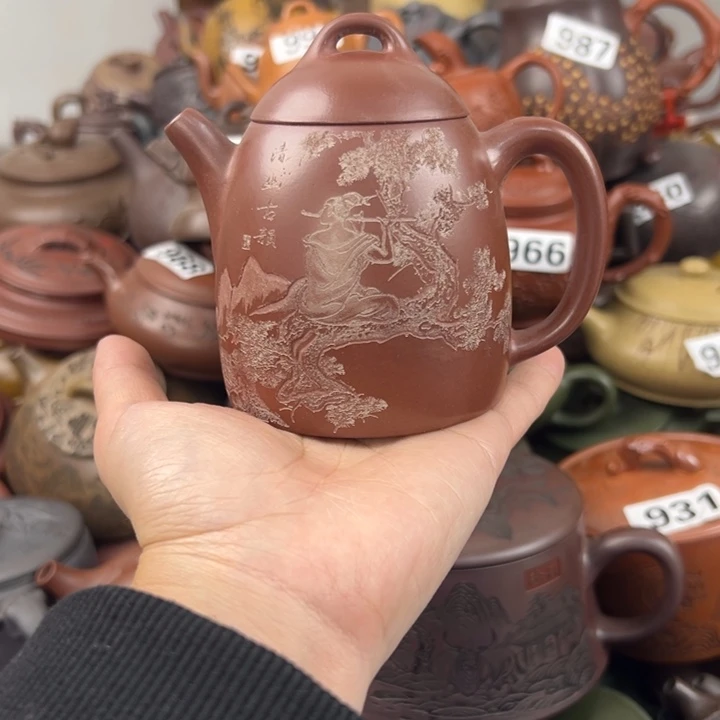 紫砂茶壶底部磕了