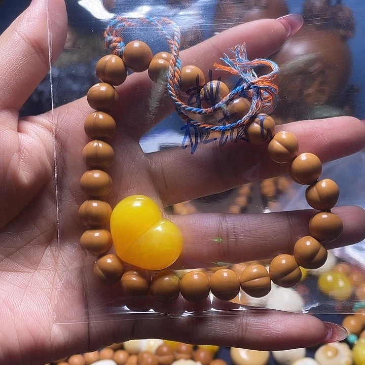 爱****猴头核桃吊坠橄榄核