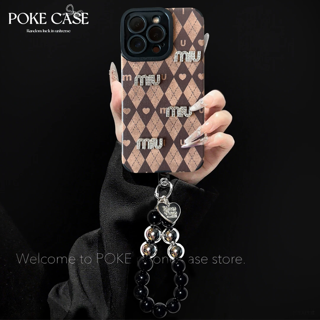 高级轻奢瞳眼翻毛皮适用苹果16华为vivo小米oppo手链手机壳女