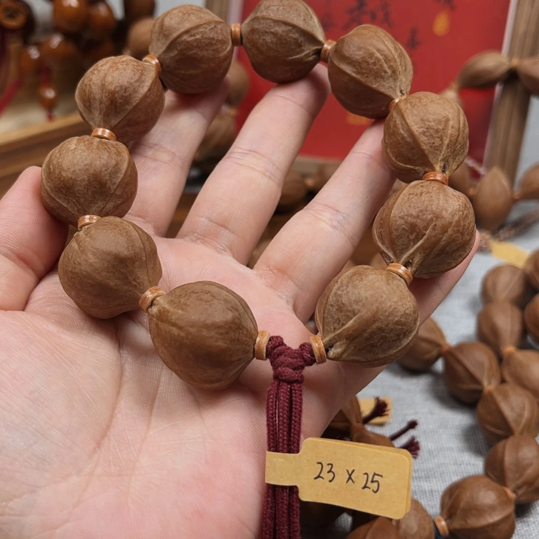 倔***头橄榄核手串梅林铁核23.25橄榄核