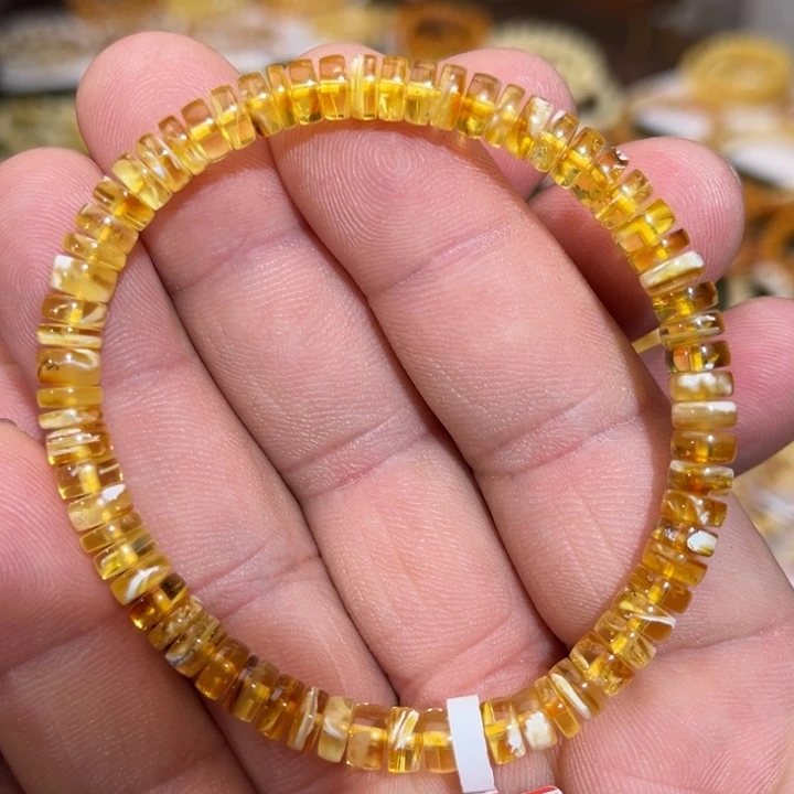 琥珀（根珀）未镶嵌手链微瑕瓷白溶洞拉丝妖花隔片6.0mm