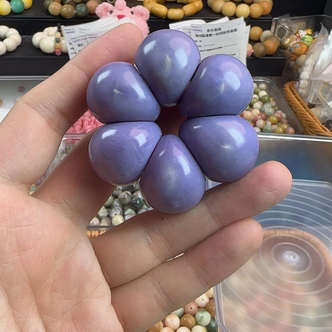 菩提根/象牙果手串瑕卡25紫色蒜瓣1个