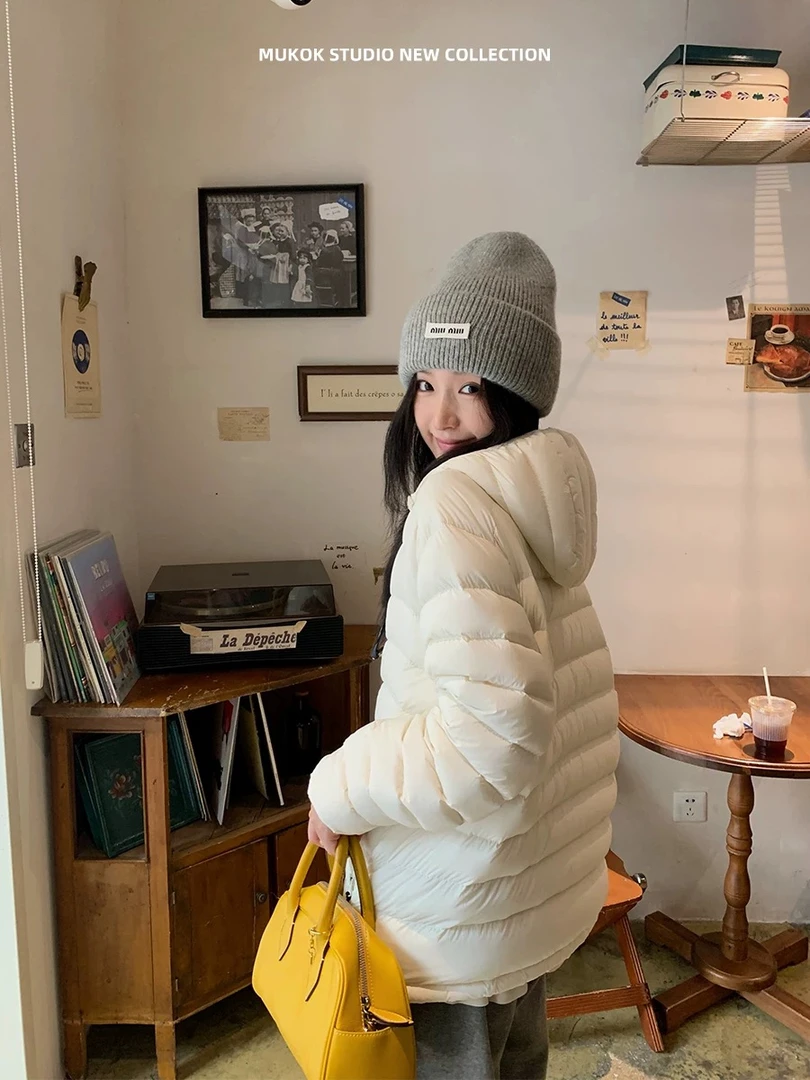 排骨羽绒服女大学生2025新款休闲运动连帽外套情侣服