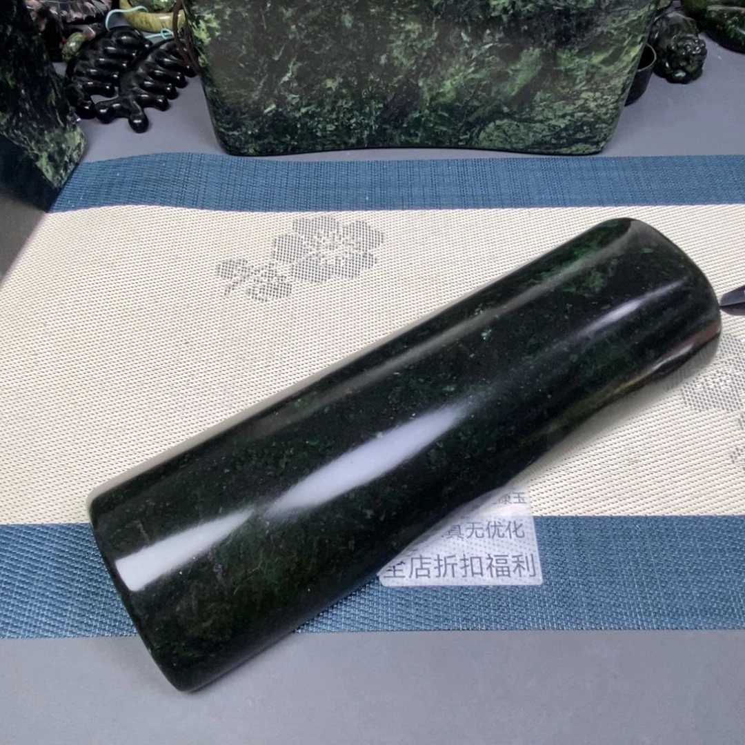 夕***奶未镶嵌蛇纹石玉药王石枕头