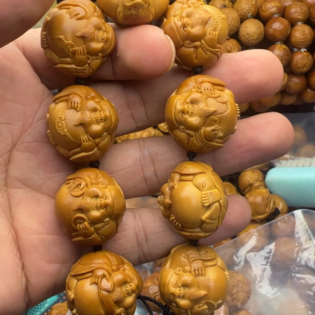 橄榄核吊坠荷叶横财