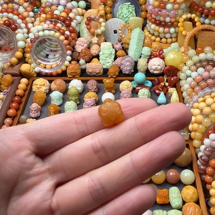 石英质玉（缅黄）未镶嵌珠宝半成品捡漏柿子