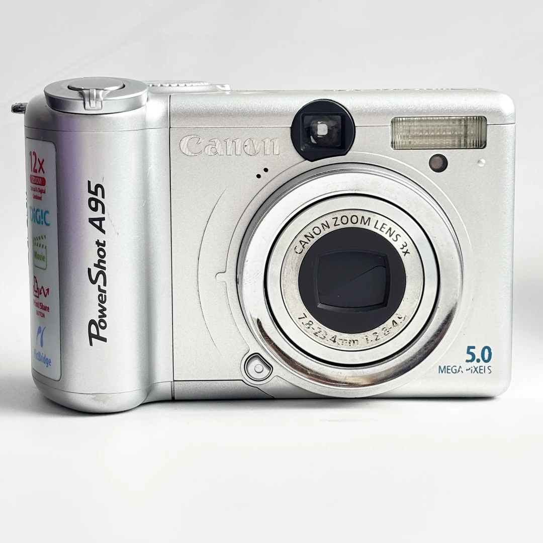 9新 Canon/佳能 A95银色500W像素3倍光变复古ccd数码相机