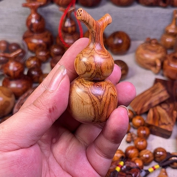 顺***然黄花梨/降香黄檀越南黄花梨油梨工艺品