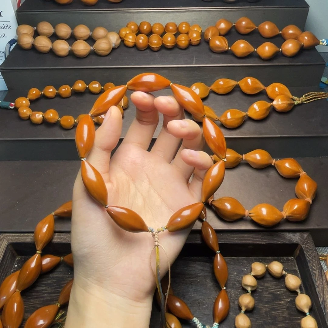 咬***子橄榄核手串橄榄核手串