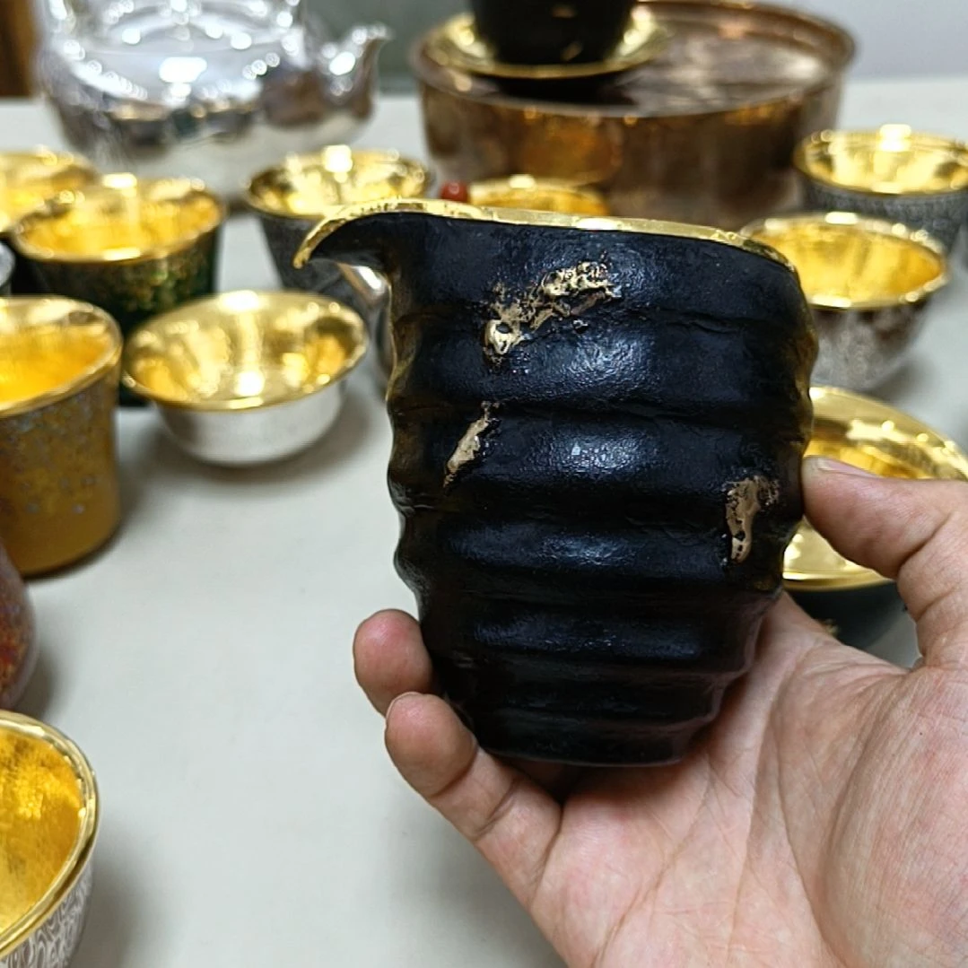 涅****?李小鹤树皮纹金公道杯