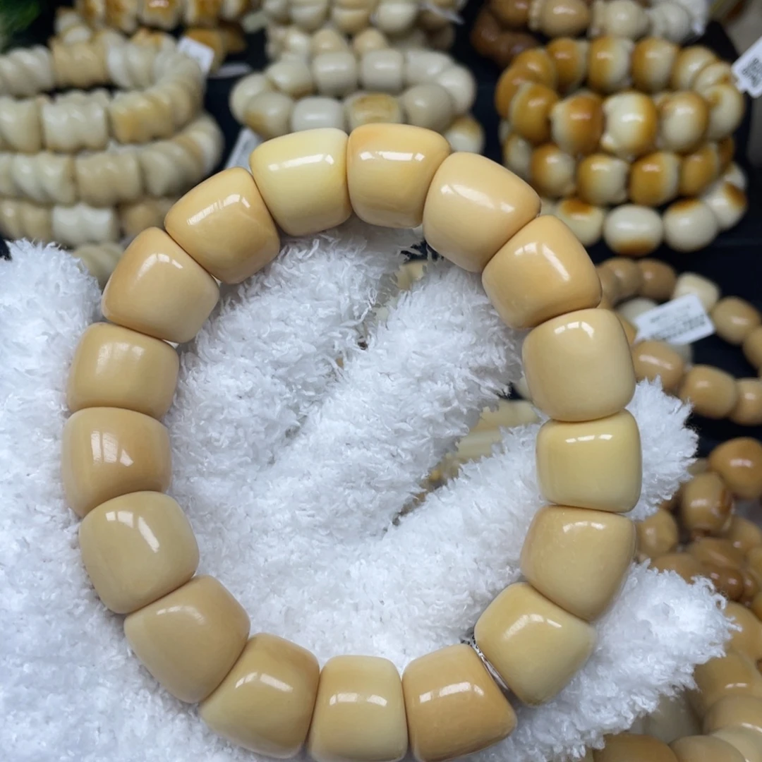 扑***敏菩提根/象牙果吊坠10,18.27瑕年糕肠