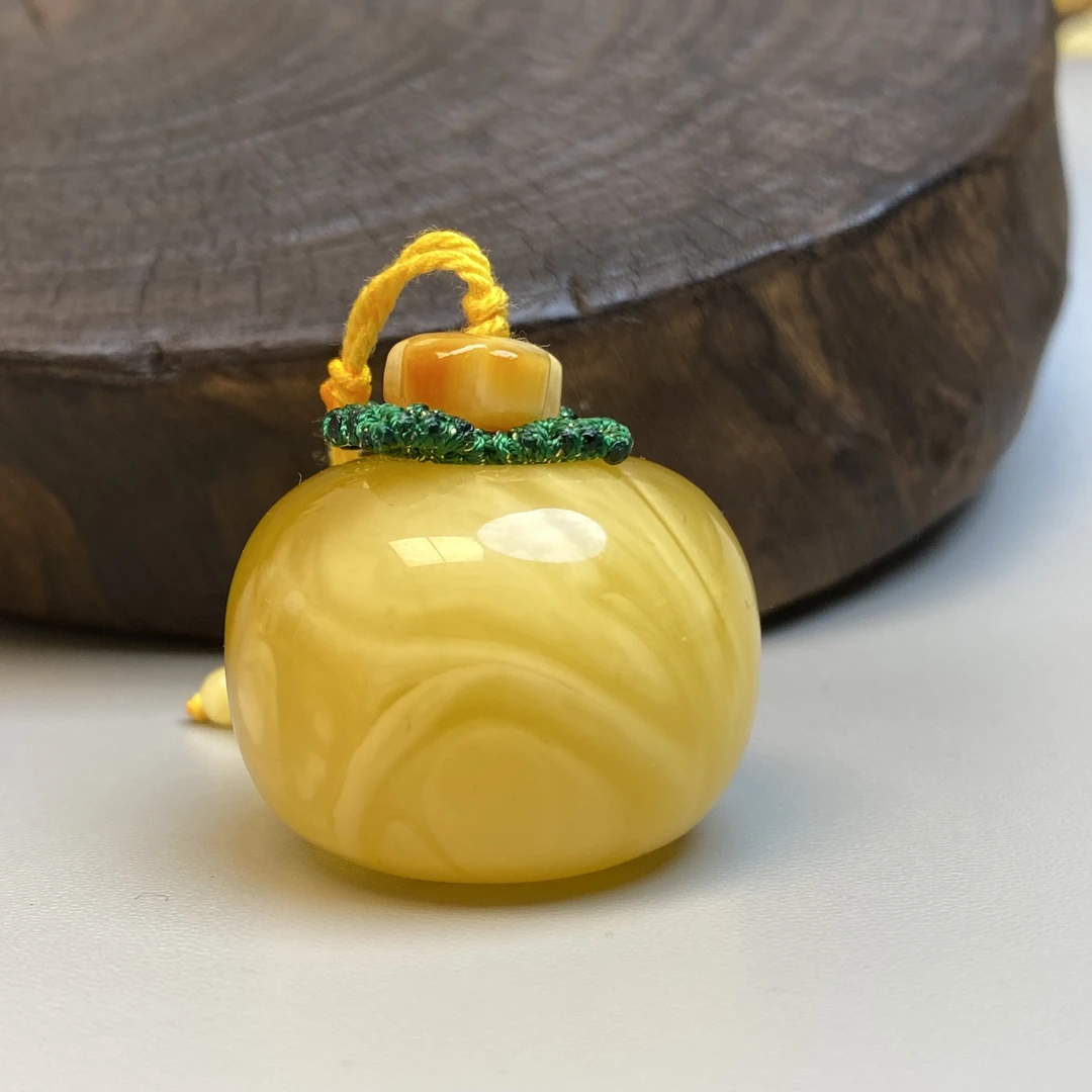 26.13克37.6×27毫米天然溶洞妖花蜜蜡墩子柿柿如意平安扣吊坠把件