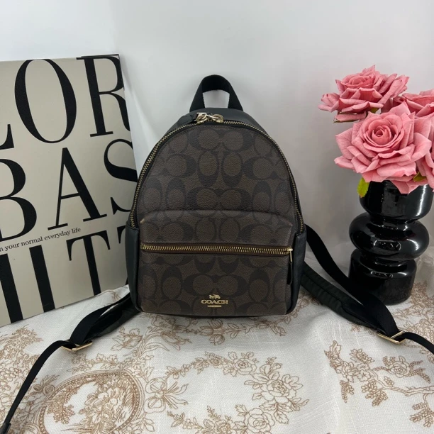 95新 COACH/蔻驰 7850/黑棕老花双肩包