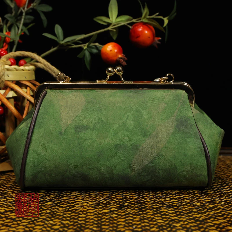 {苏梦}水仙花国风复古手拿包贝壳包0503134