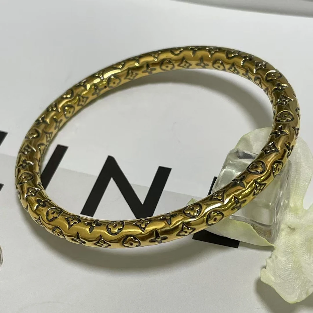 金潮坊珠宝  时尚气质复古个性电黑工艺足金999气质老花手镯