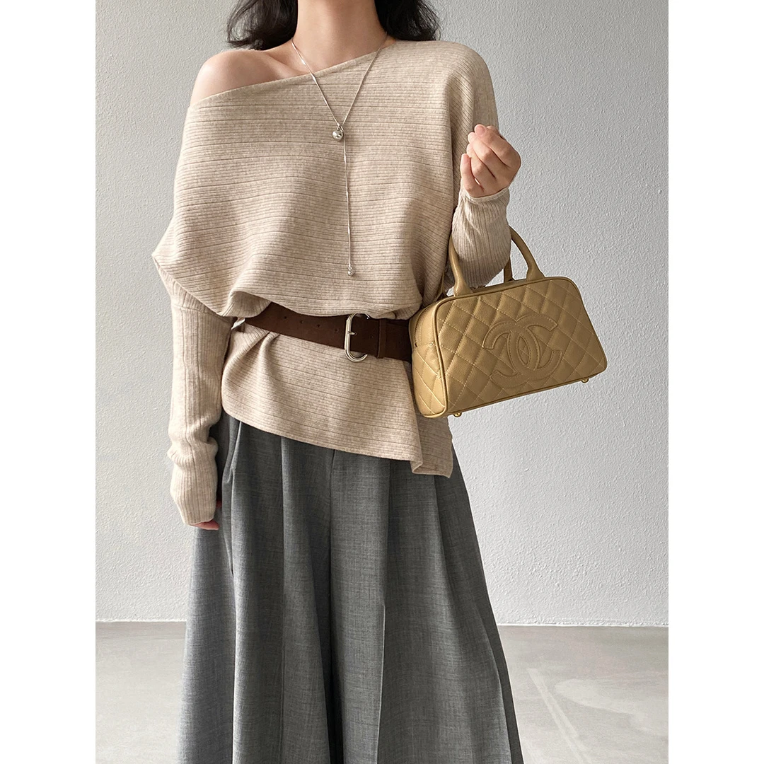 韩系高级感长袖斜肩针织衫女早秋气质配腰带不规则针织上衣