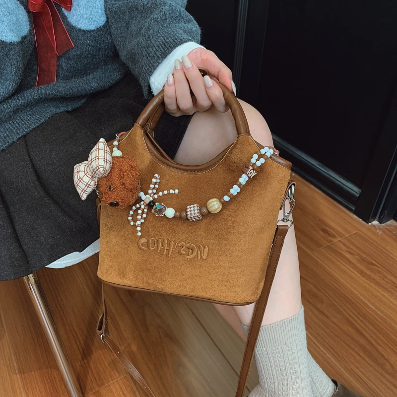 大容量百搭小狗串珠菜篮子包2025新款秋冬时尚休闲单肩手提水桶包