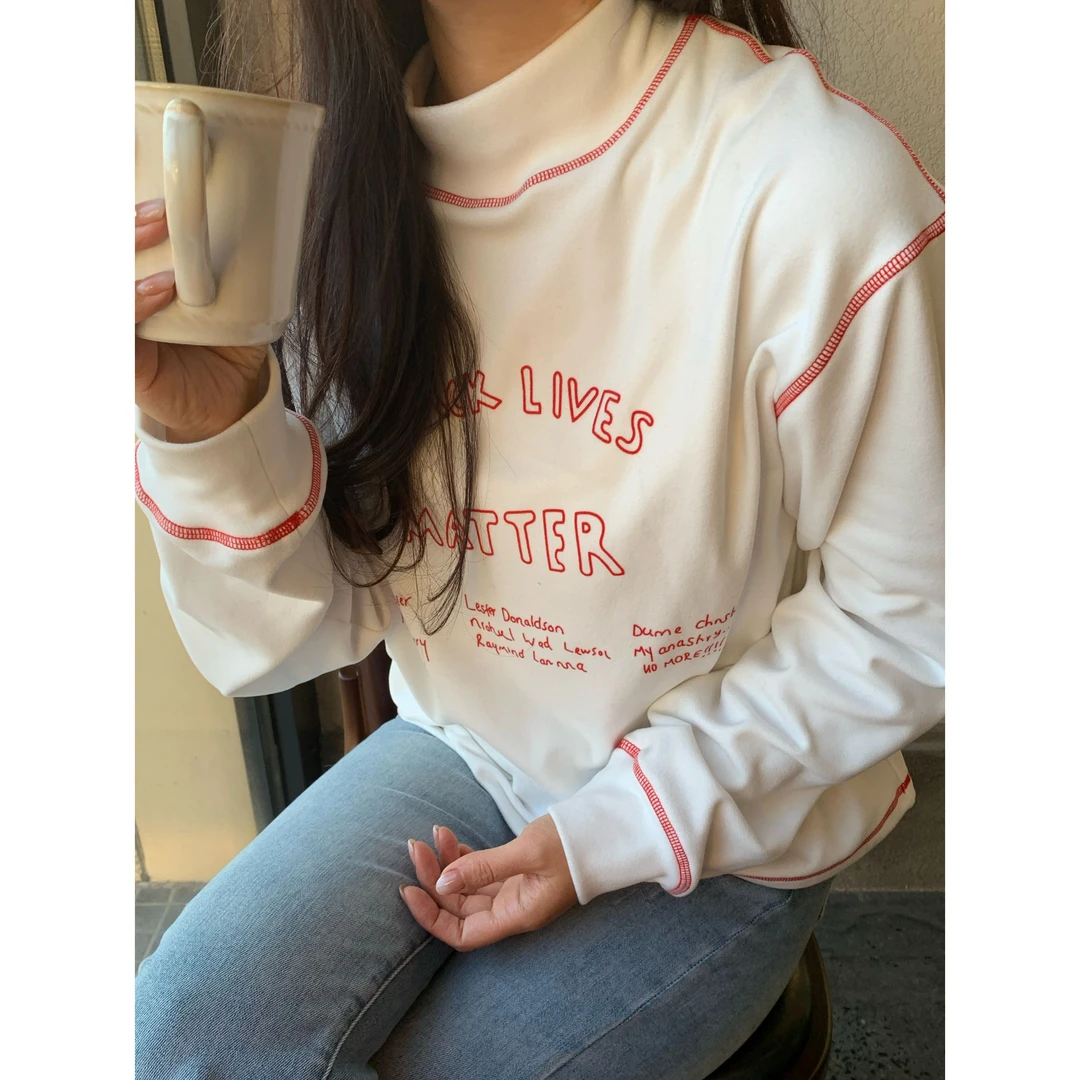 韩代.明线字母德绒半高领打底衫L25121209