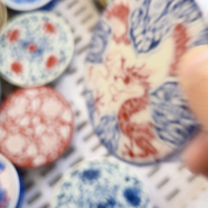 瓷片釉里红穿花龙盖置