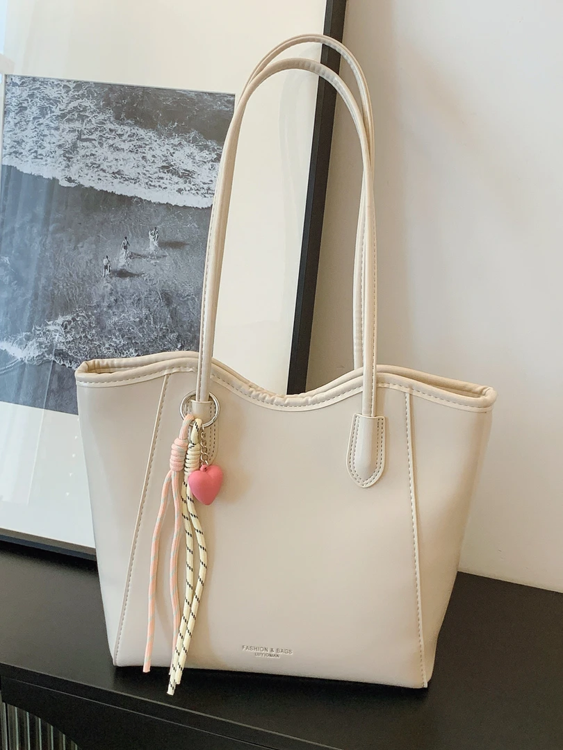 【带挂件】亮面油蜡皮大容量通勤风托特包