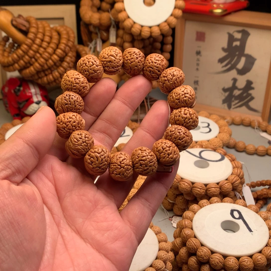 K***~桃核手串1.9豁牙子桃核手串