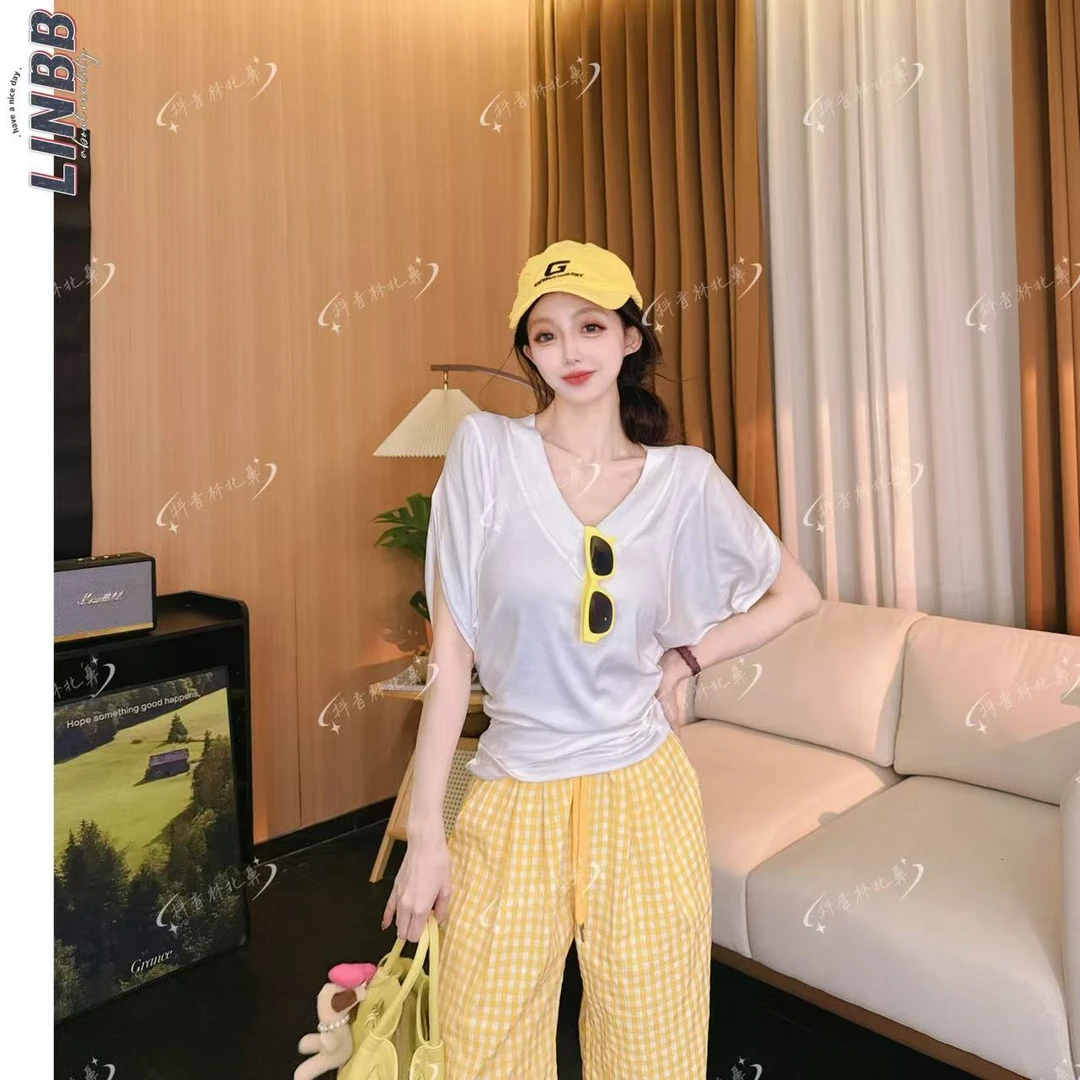 林北鼻-【阿拉善】韩单夏日显瘦蝴蝶袖弹力设计上衣T恤