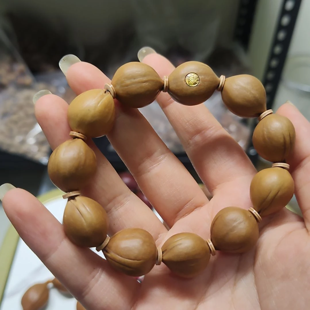 胖***昕吊坠橄榄核1618尺寸水晶核手串