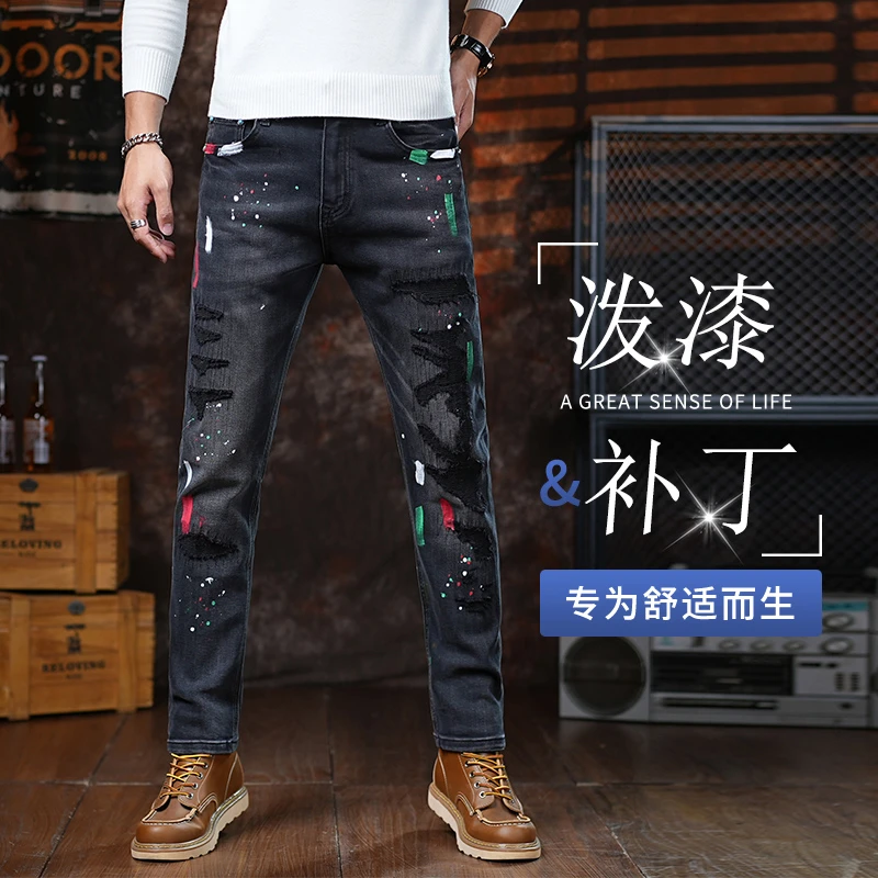 香港高端秋冬新款修身小直筒男士牛仔裤长裤泼墨补丁时尚黑色潮流