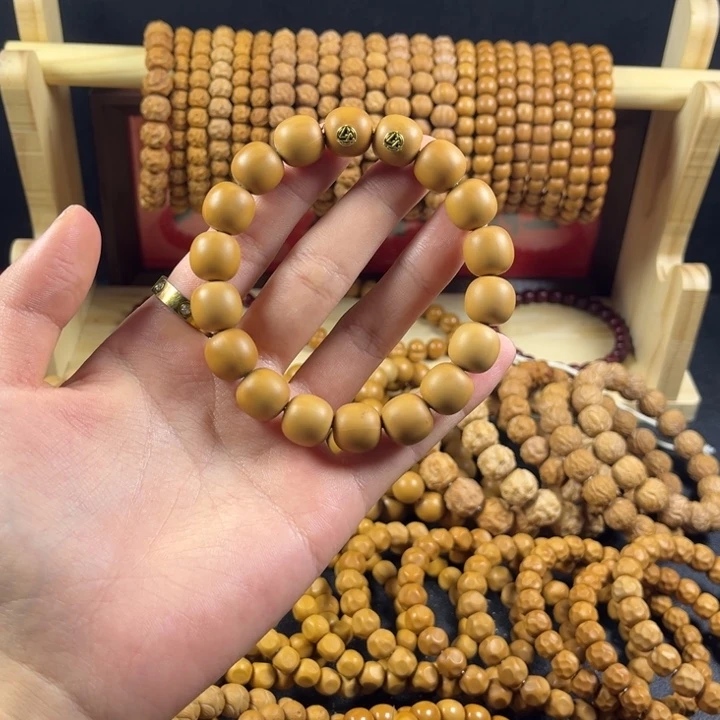 凡***人猴头核桃吊坠瑕疵双标正圆光珠