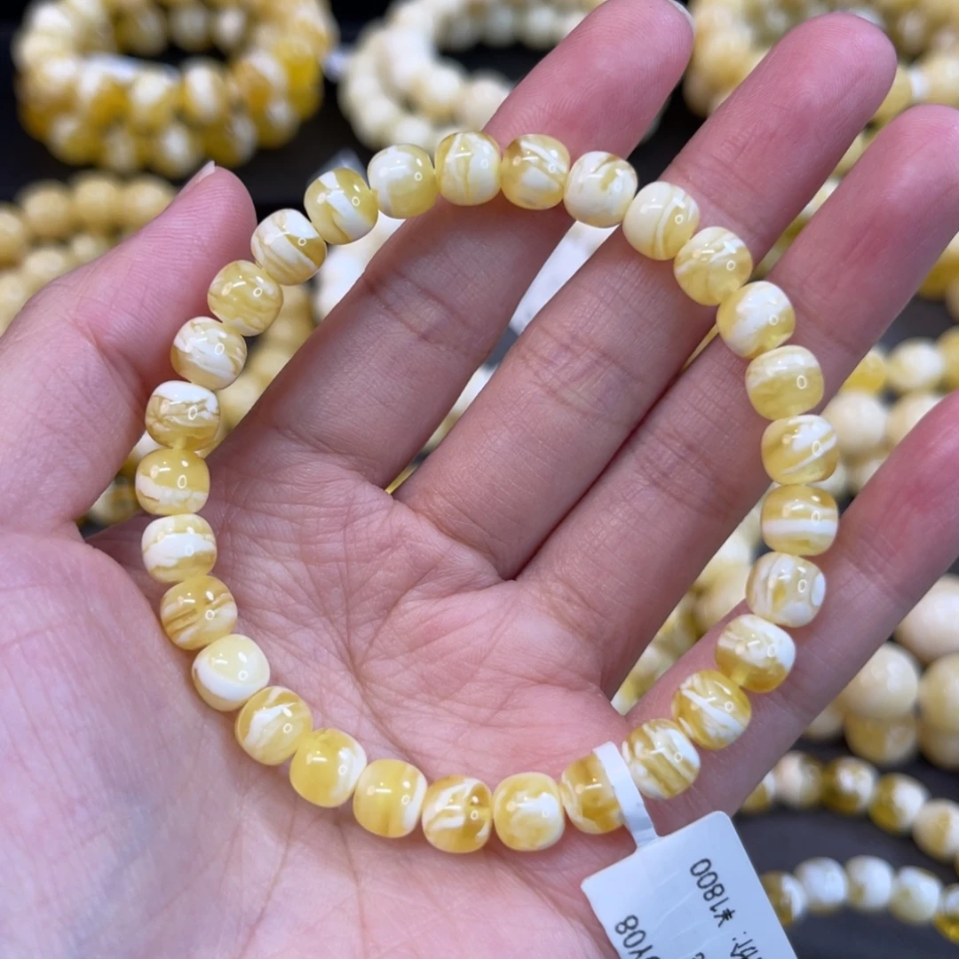 蜜蜡未镶嵌手串7*6.5mm金瓷白虎皮妖花