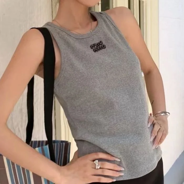 99新 MIU MIU/缪缪 99新/Miumiu/缪缪/背心/S码/Xspk1357