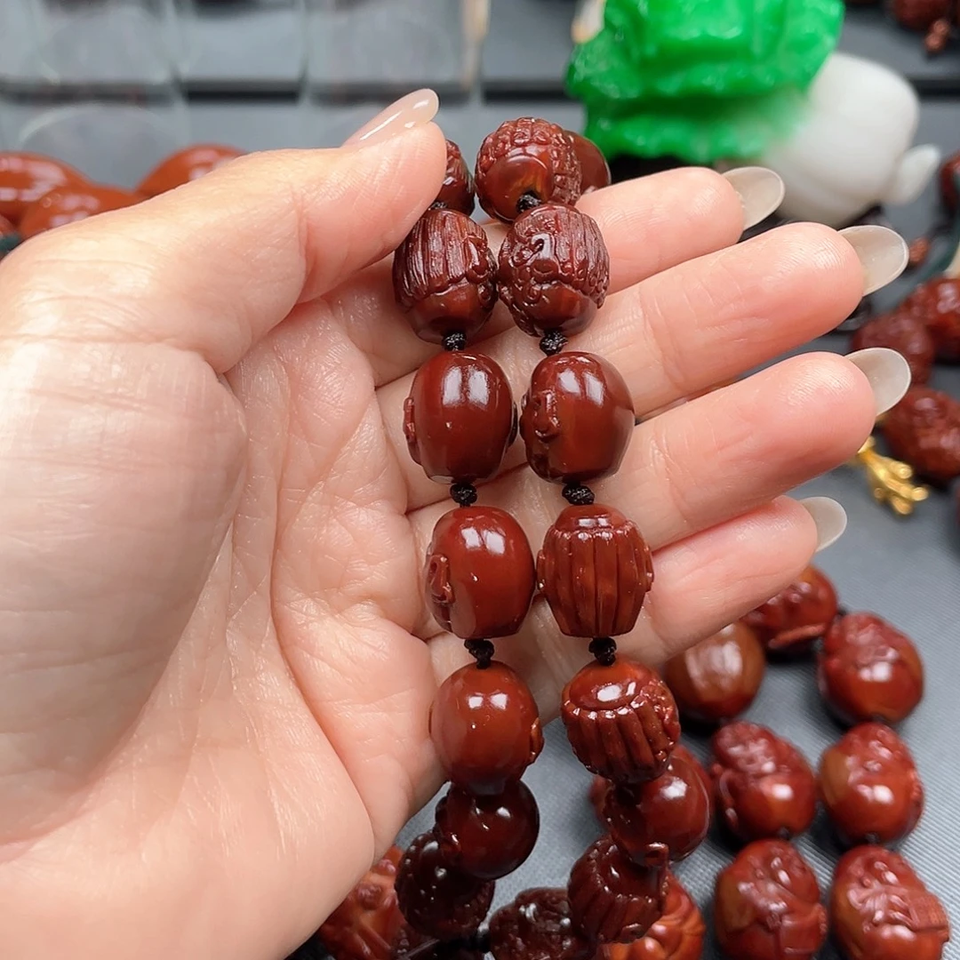 宏***歌橄榄核手串十八罗汉