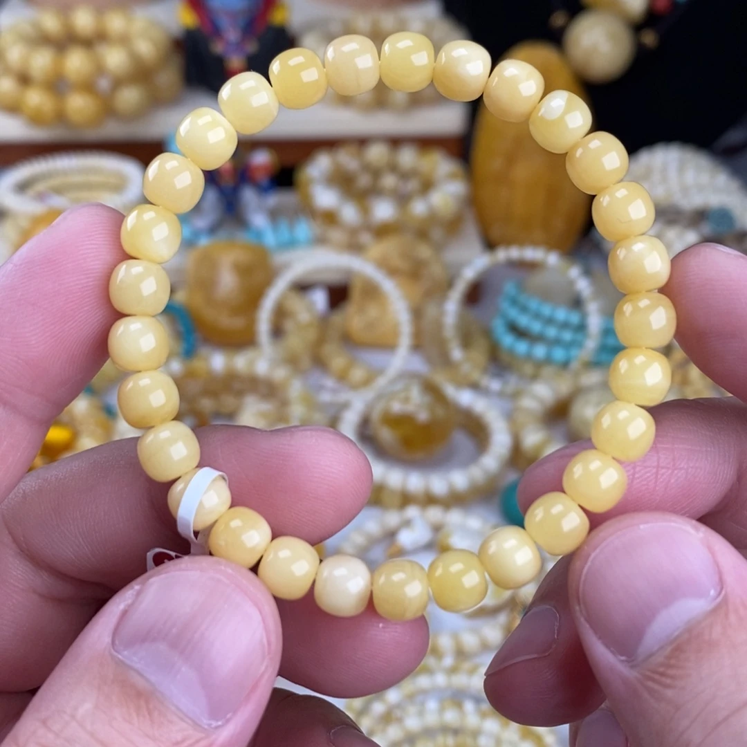 柚***籽蜜蜡未镶嵌手链鸡油黄浓蜡7mm高桩