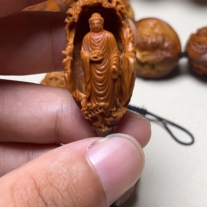 M***X橄榄核手串镂空阿弥陀佛