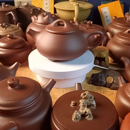 紫砂茶壶还***?精工半手，原矿紫砂泥料。