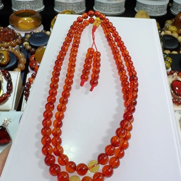 郭***郭琥珀未镶嵌裸石天然缅甸血珀108链，规格6+