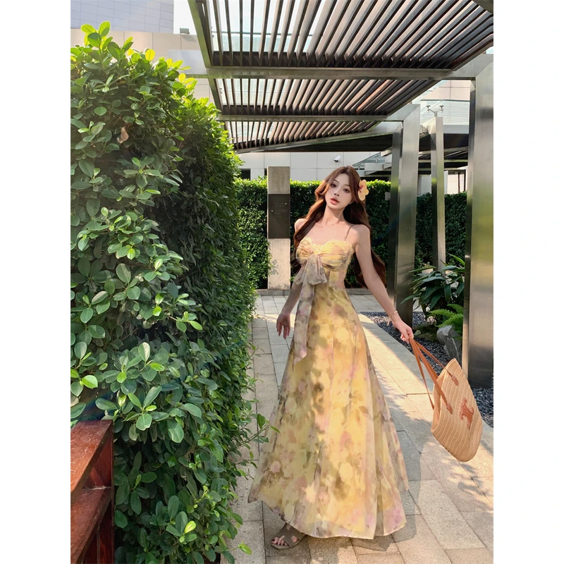 超仙度假风海边性感碎花仙女裙2025新款性感小众设计镂空连衣裙女