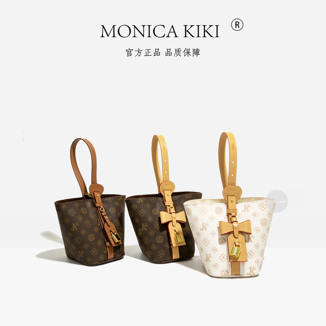 MONICA KIKI/莫妮卡奇奇新款时尚休闲水桶包百搭轻奢印花手提包女