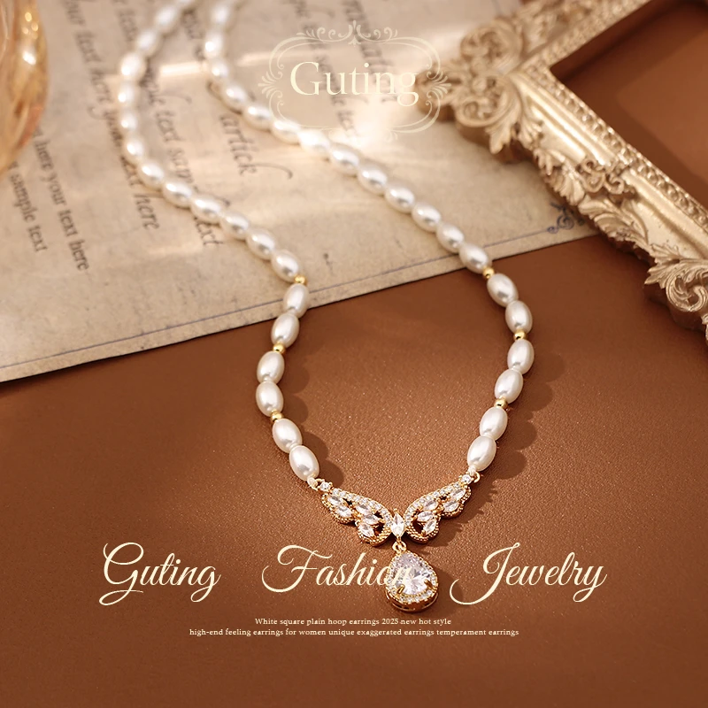 铜合金项链 7149金色蝴蝶翅膀水滴项链女秋冬配饰品高级感毛衣链