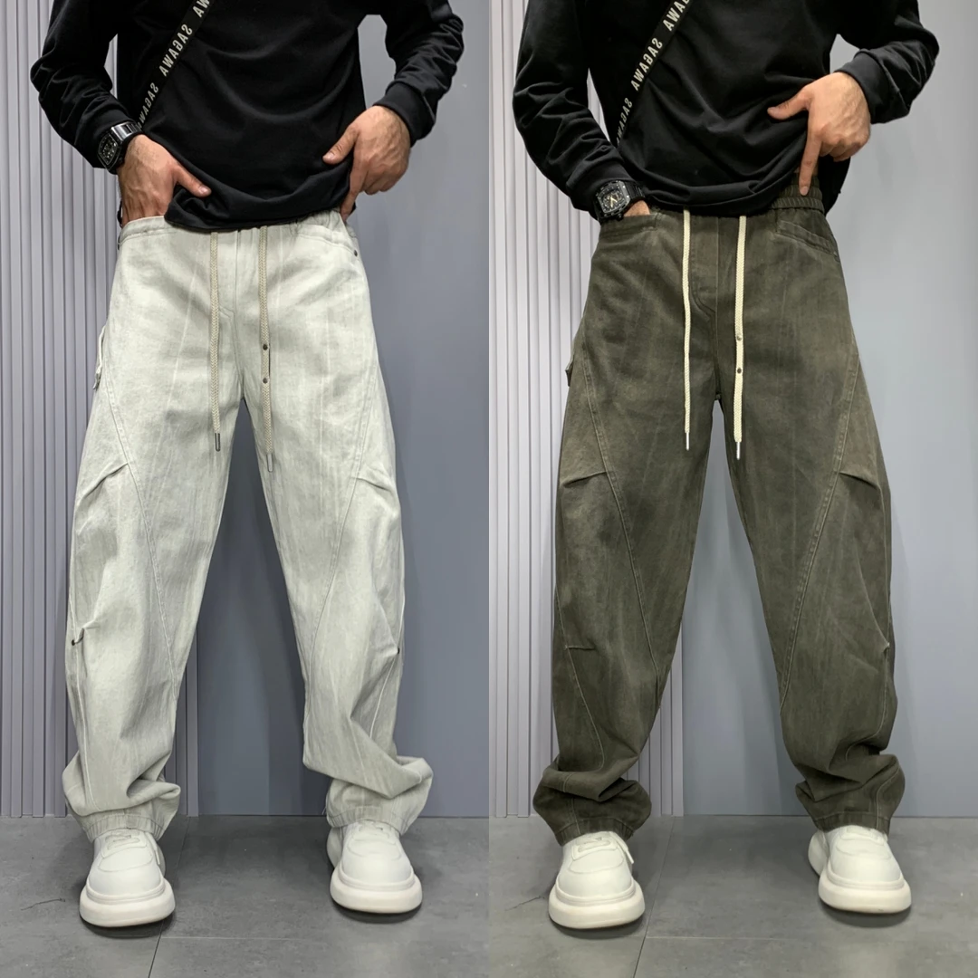 美式街头男士立体剪裁个性金属铆钉装饰弯刀裤秋季新款休闲直筒裤